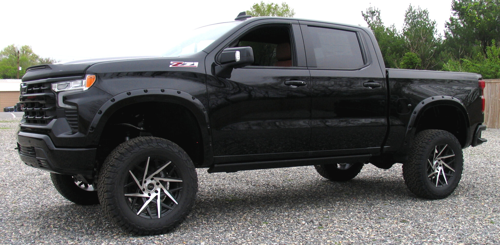 Custom Upfitted & Lifted Trucks - Customizers Quality Conversions